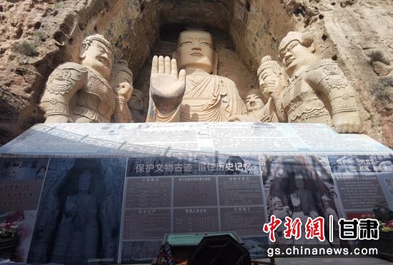 時下，中國“石窟鼻祖”天梯山石窟第13窟大佛足部與局部危巖體搶救性保護項目正在施工。圖為施工現(xiàn)場。陳曉斌 攝