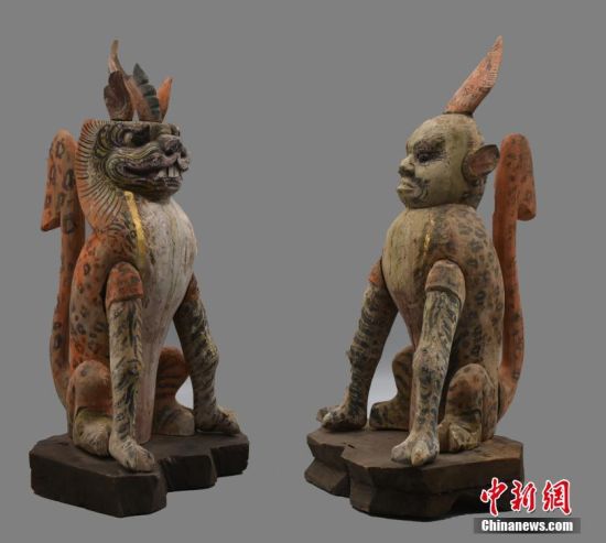 圖為慕容智墓出土鎮(zhèn)墓獸。 中新社發(fā) 甘肅省文物局 供圖
